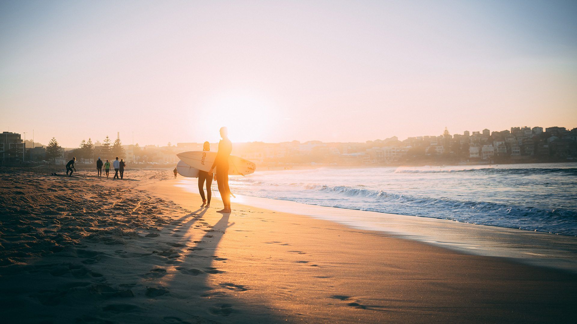 Morning surfers at iconic Bondi Beach