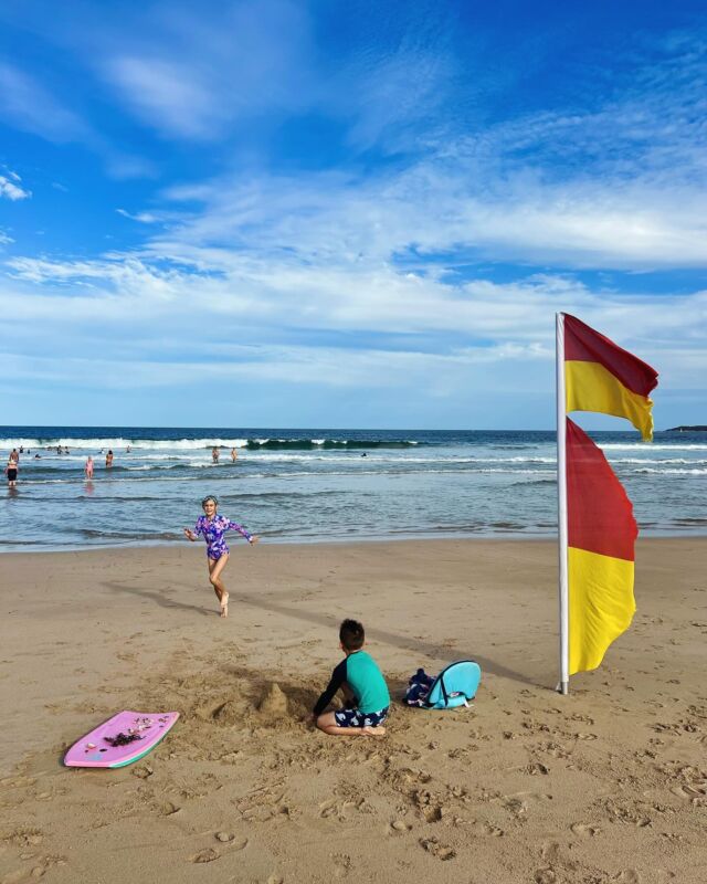 In Australia we love beach life and most of us live pretty close to the coast. Our kids learn to swim before they can walk and as with this photo, snapped on today’s after school beazh trip, we are always advised to swim between the flags.